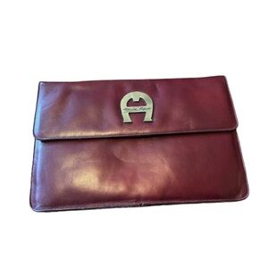 Etienne Aigner Wine Leather Fold-Over Clutch with Signature Metal Emblem
